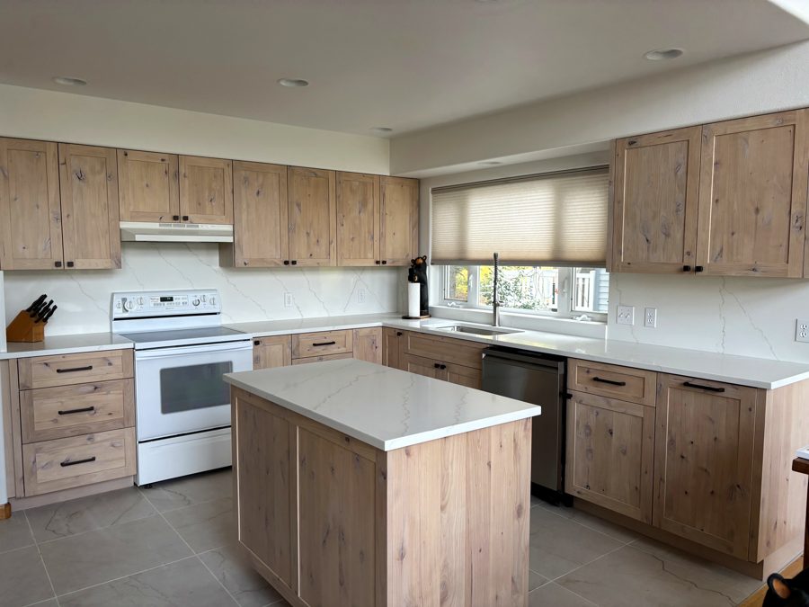 After photo of lighter custom kitchen cabinets by Whitefish Lake